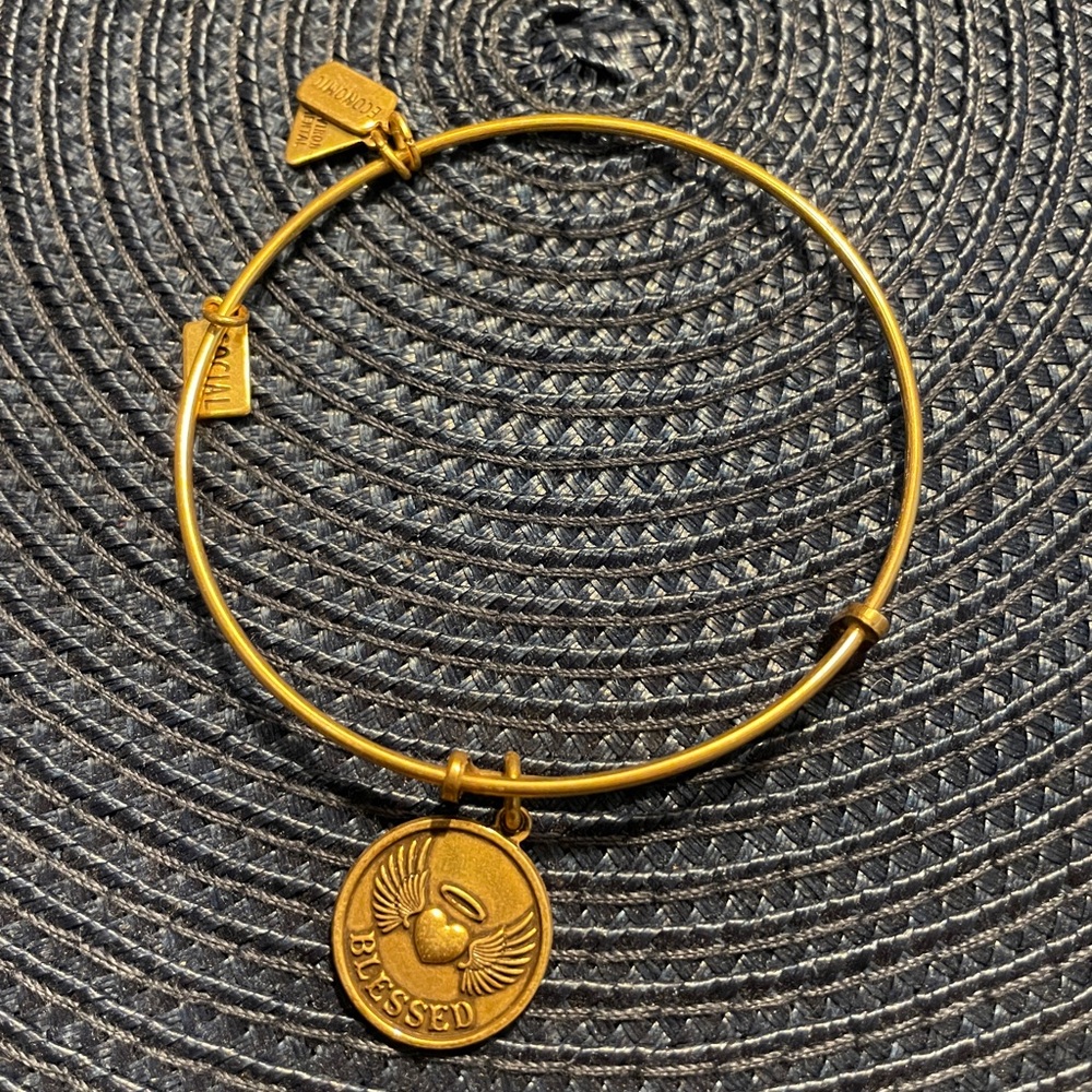Gold Bangle Bracelet with Blessed Charm